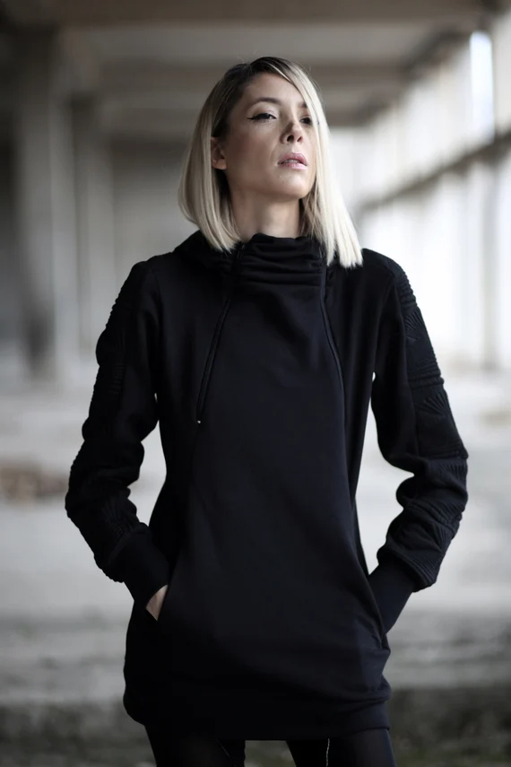 Women's black hoodie is a versatile and essential piece of clothing that offers both comfort and style. When it comes to styling