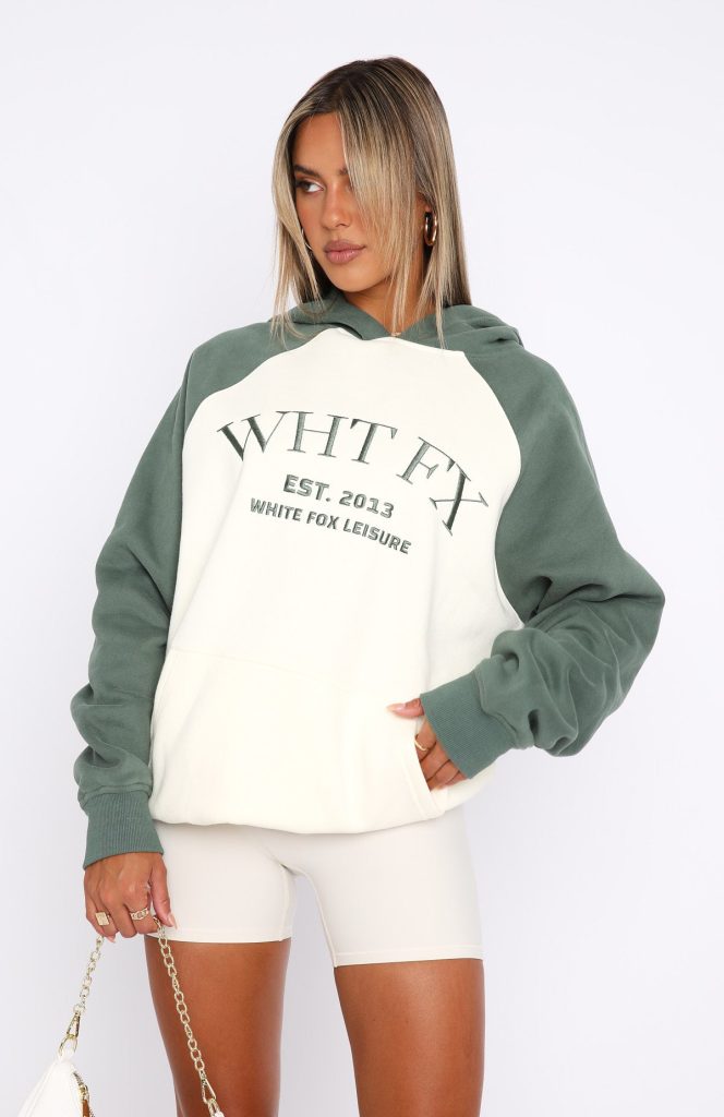 Women's white fox hoodie is a versatile and fashionable clothing item that can elevate any outfit. With its cozy and chic appeal