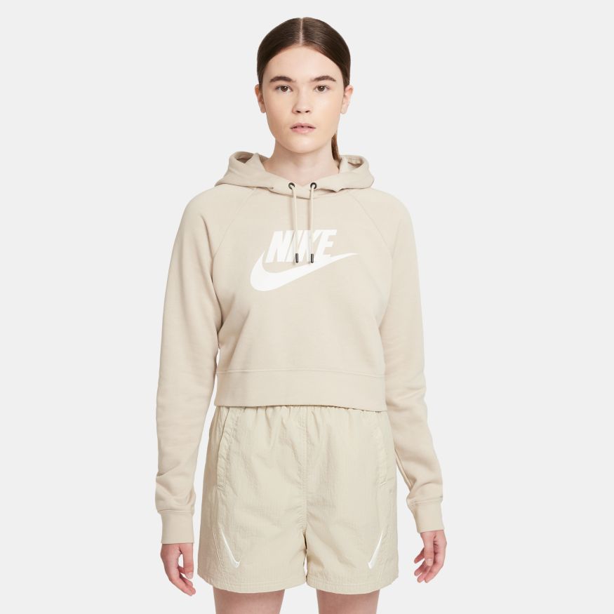 Beige nike hoodie is a versatile top